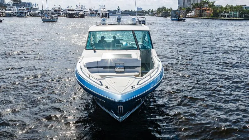 Slide: The Image of 2019 Formula 430 All Sport Crossover boat on water, front view. - 11