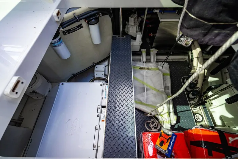 Slide: The Image of Engine room of 2019 Formula 430 All Sport Crossover boat with equipment and storage. - 29