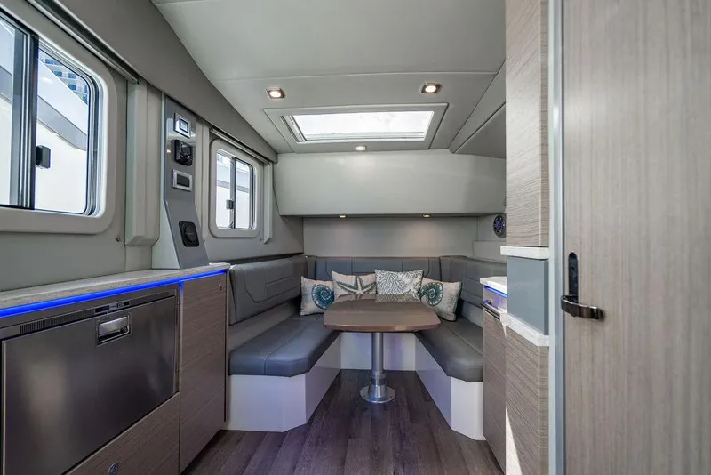 Slide: The Image of 2019 Formula 430 All Sport Crossover interior with modern seating and skylight. - 33