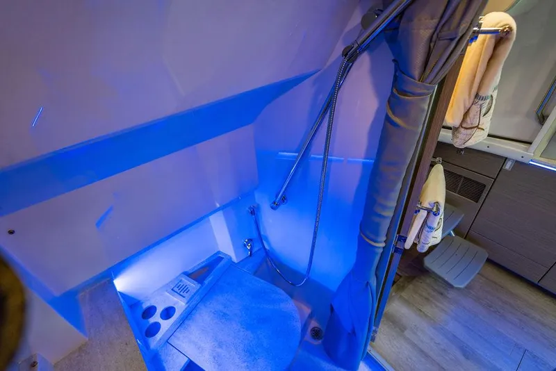 Slide: The Image of 2019 Formula 430 All Sport Crossover bathroom with blue lighting and modern fixtures. - 45