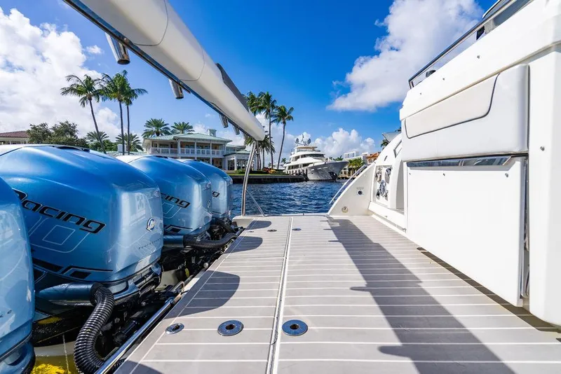 Slide: The Image of 2019 Formula 430 All Sport Crossover boat with powerful engines docked by waterfront homes. - 49