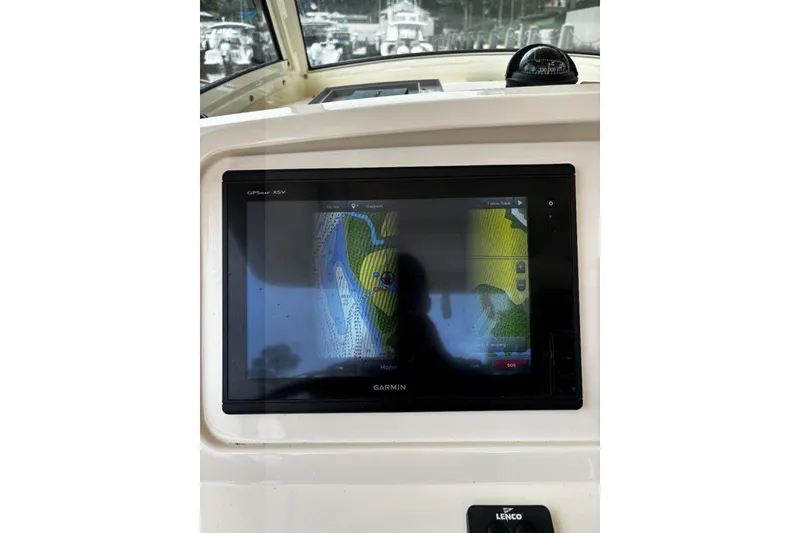Slide: The Image of Garmin GPS display on 2019 Scout 255 LXF boat dashboard. - 13