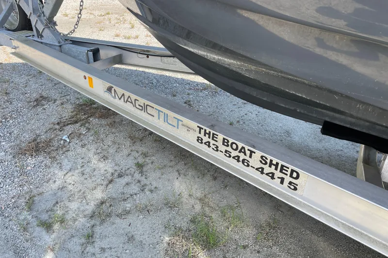 Slide: The Image of Boat trailer with Magic Tilt and The Boat Shed branding. - 18