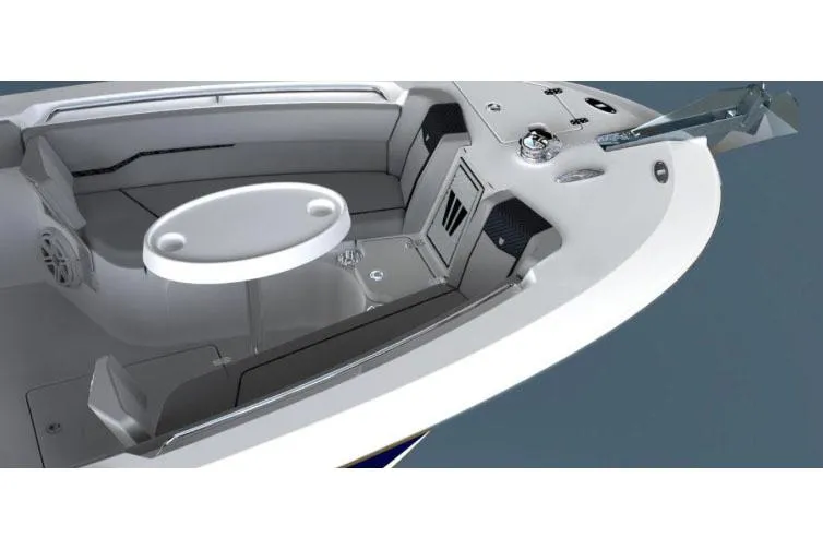 Slide: The Image of Manufacturer Provided Image: 2026 Wellcraft 243 Fisherman boat interior with seating and round table. - 4