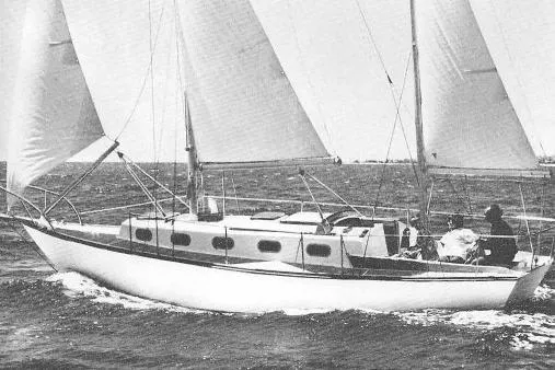 The Image of 1976 Cape Dory 30 sailboat navigating open waters with full sails. - 0