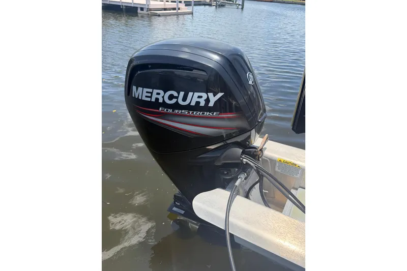 Slide: The Image of Mercury FourStroke engine on 2019 Sun Tracker Party Barge 20 DLX pontoon boat. - 12