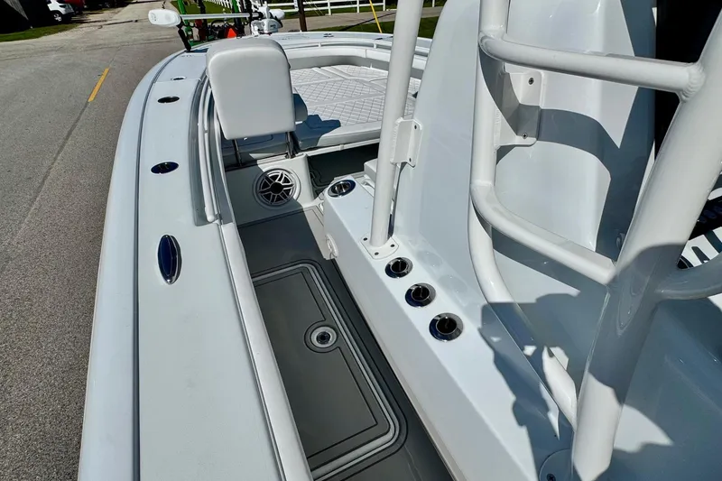Slide: The Image of 2023 Barker Boatworks 26 Open interior with seating and storage compartments. - 13