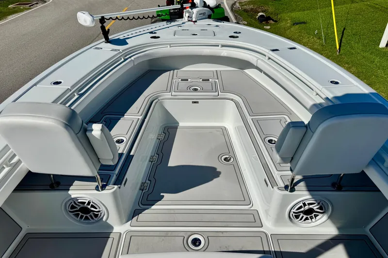 Slide: The Image of 2023 Barker Boatworks 26 Open deck with seating and storage compartments. - 19