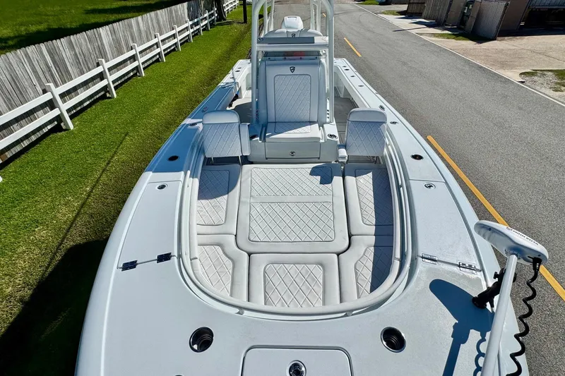 Slide: The Image of 2023 Barker Boatworks 26 Open, spacious deck, luxurious seating, modern design. - 20