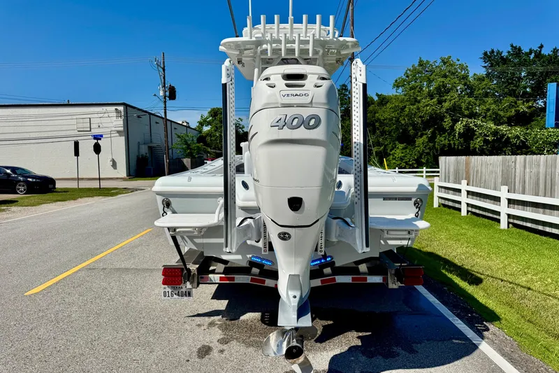Slide: The Image of 2023 Barker Boatworks 26 Open with 400 Verado engine on trailer. - 3