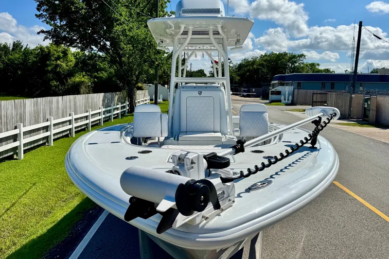 Slide: The Image of 2023 Barker Boatworks 26 Open on road, showcasing sleek design and advanced features. - 6
