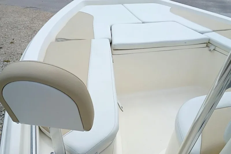 Slide: The Image of 2023 Bulls Bay 2200 boat interior with beige and white seating. - 18