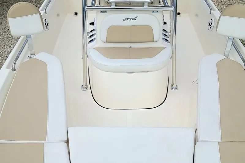 Slide: The Image of 2023 Bulls Bay 2200 boat interior with beige and white seating. - 22