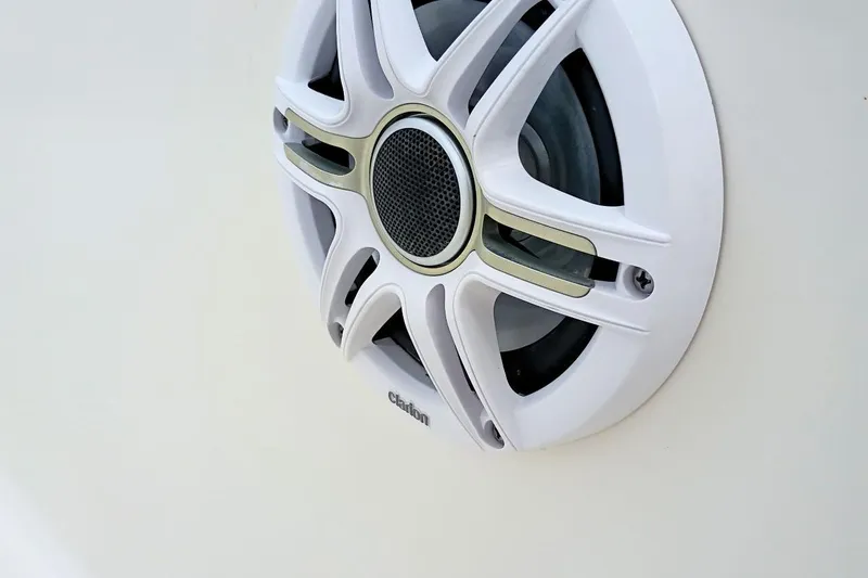 Slide: The Image of Clarion speaker on 2023 Bulls Bay 2200 boat, featuring sleek white design. - 29