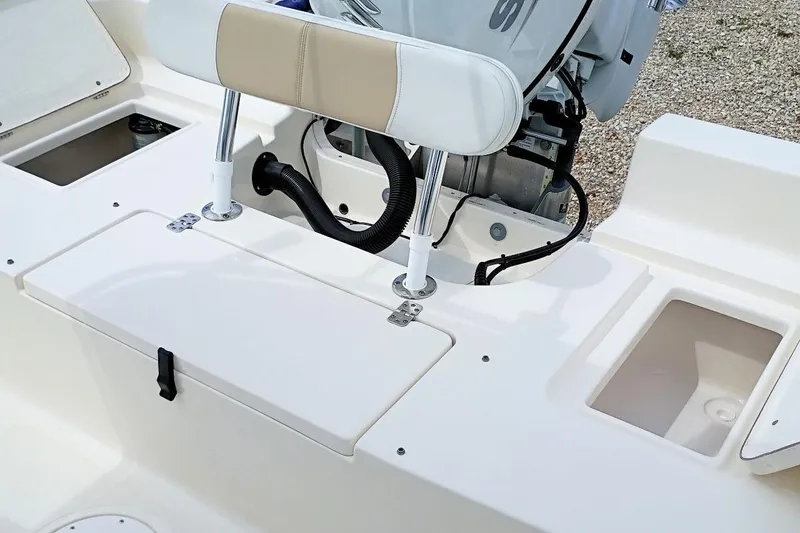 Slide: The Image of 2023 Bulls Bay 2200 boat interior with seating and storage compartments. - 34
