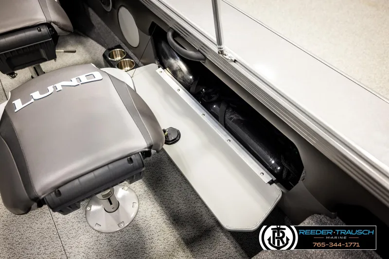 Slide: The Image of 2023 Lund 1875 Tyee boat interior with branded seat and storage compartment. - 34