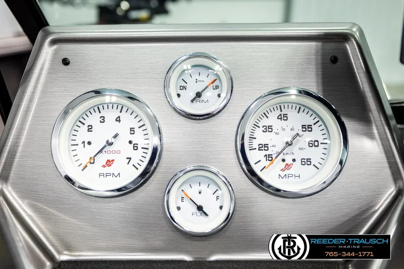 Slide: The Image of Dashboard of 2023 Lund 1875 Tyee boat with RPM, MPH, and fuel gauges. - 39