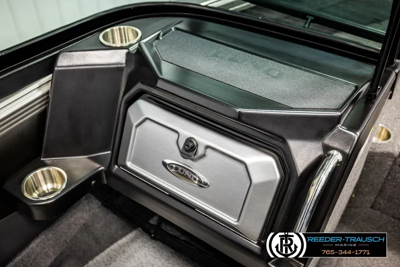 Slide: The Image of 2023 Lund 1875 Tyee boat interior with cup holders and storage compartment. - 47