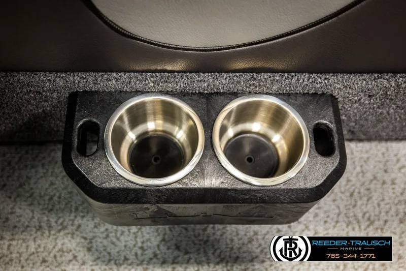 Slide: The Image of Dual cup holders in 2023 Lund 1875 Tyee boat interior, Reeder-Trausch Marine branding. - 48