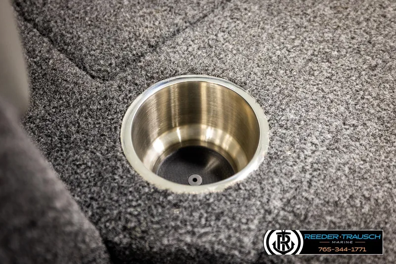 Slide: The Image of 2023 Lund 1875 Tyee boat interior with stainless steel cup holder. - 49