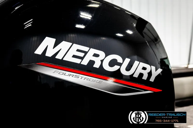 Slide: The Image of Mercury FourStroke engine on 2023 Lund 1875 Tyee boat, Reeder-Trausch Marine logo visible. - 56