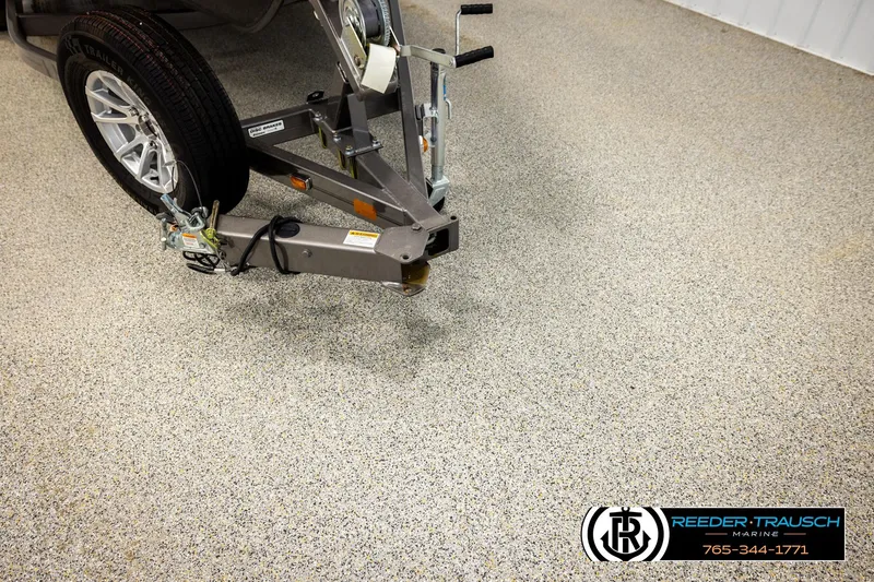 Slide: The Image of Trailer hitch of 2023 Lund 1875 Tyee boat on showroom floor. - 59