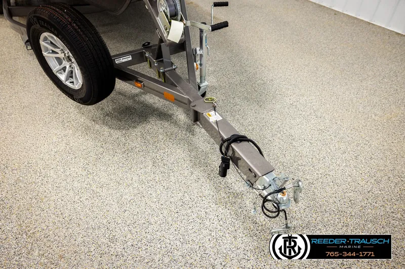 Slide: The Image of 2023 Lund 1875 Tyee trailer hitch on speckled flooring at Reeder-Trausch Marine. - 60