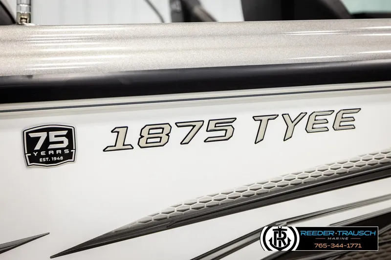 Slide: The Image of 2023 Lund 1875 Tyee boat, 75th anniversary edition, Reeder-Trausch Marine branding. - 64