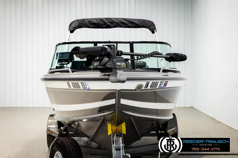 Slide: The Image of 2023 Lund 1875 Tyee boat on trailer in indoor showroom. - 8