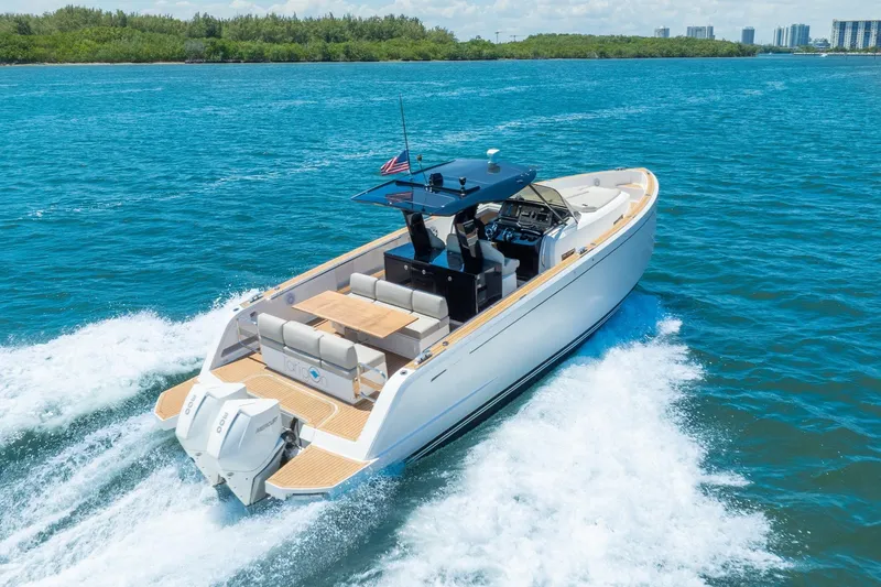 Slide: The Image of 2020 Pardo Yachts 38 cruising on blue water, showcasing sleek design and powerful engines. - 12