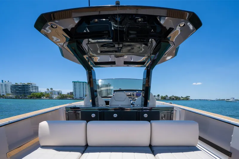 Slide: The Image of 2020 Pardo Yachts 38 on water, featuring sleek design and luxurious seating. - 17