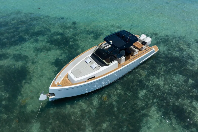 Slide: The Image of 2020 Pardo Yachts 38 in clear turquoise water, showcasing sleek design and luxury features. - 31