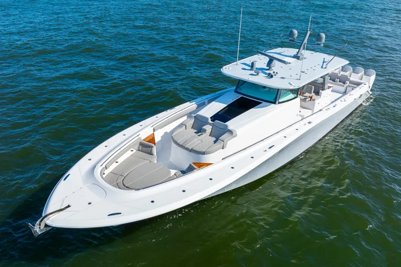 Slide: The Image of 2027 HCB 65 Estrella luxury yacht cruising on open water. - 12