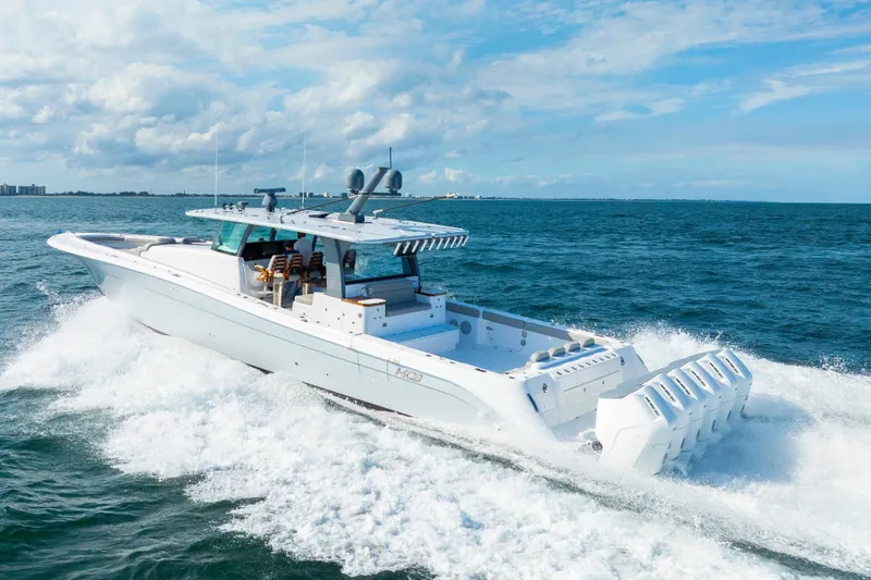 Slide: The Image of 2027 HCB 65 Estrella yacht cruising on open ocean under blue sky. - 15