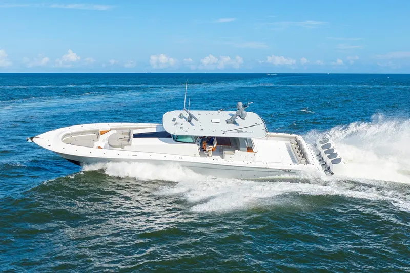 Slide: The Image of 2027 HCB 65 Estrella cruising on open ocean, showcasing sleek design and powerful engines. - 17