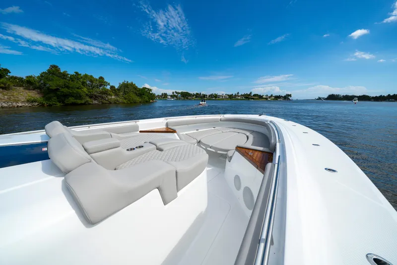 Slide: The Image of Luxurious 2027 HCB 65 Estrella yacht with spacious deck and scenic water view. - 20