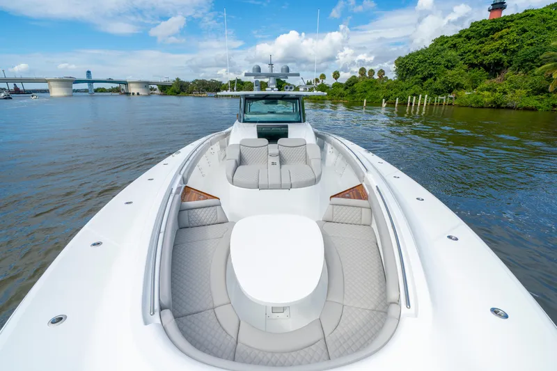 Slide: The Image of Luxury HCB 65 Estrella yacht cruising on a scenic river, 2027 model. - 25