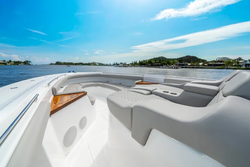 Slide: The Image of Luxurious seating on 2027 HCB 65 Estrella yacht, cruising on a sunny day. - 29