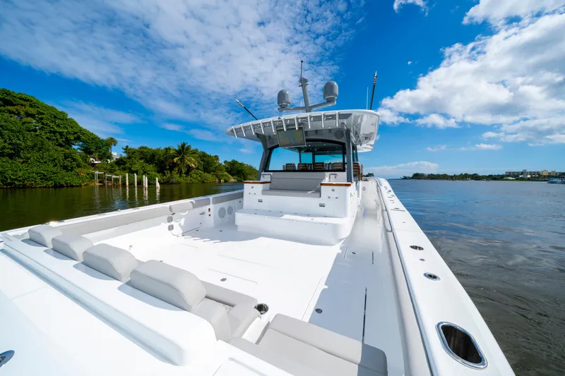 Slide: The Image of Luxurious 2027 HCB 65 Estrella yacht cruising on a sunny day, showcasing spacious deck. - 35