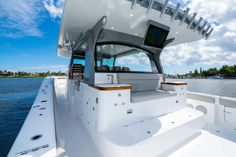 Slide: The Image of 2027 HCB 65 Estrella luxury boat with sleek design on a sunny day. - 39
