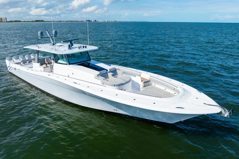 Slide: The Image of 2027 HCB 65 Estrella luxury yacht cruising on open water. - 4