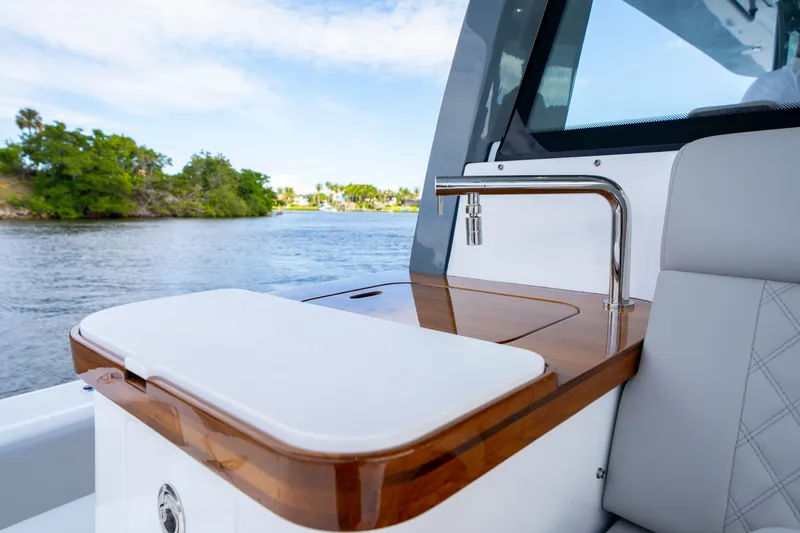 Slide: The Image of Luxury interior of 2027 HCB 65 Estrella yacht with sleek design and water view. - 44
