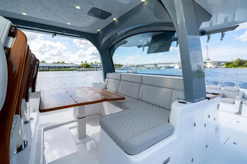 Slide: The Image of Luxurious interior of 2027 HCB 65 Estrella yacht with elegant seating and wooden table. - 45