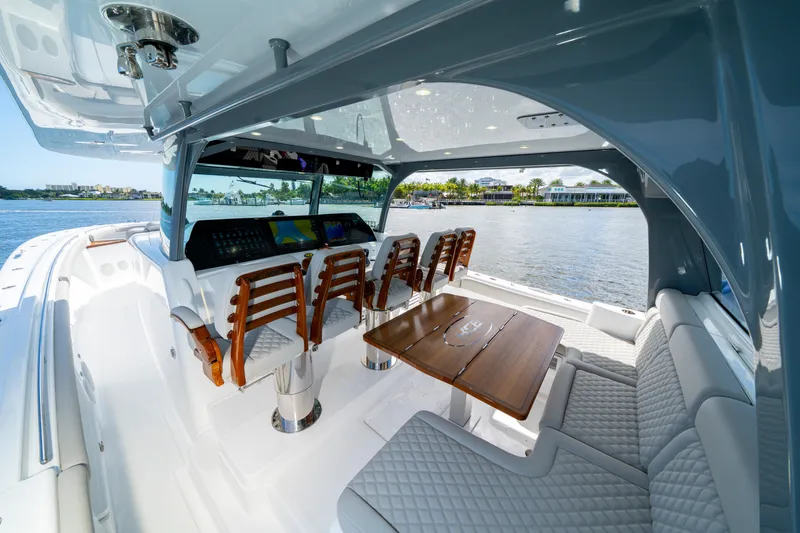 Slide: The Image of Luxurious interior of 2027 HCB 65 Estrella yacht with elegant seating and scenic water view. - 47