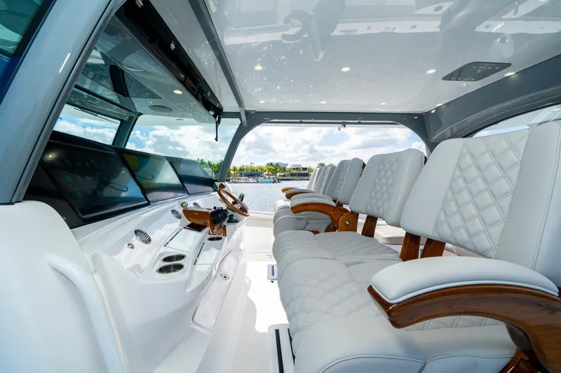 Slide: The Image of Luxurious interior of 2027 HCB 65 Estrella yacht with plush seating and advanced controls. - 54
