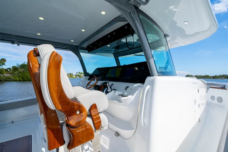 Slide: The Image of Luxurious helm of 2027 HCB 65 Estrella yacht with elegant seating and advanced controls. - 58