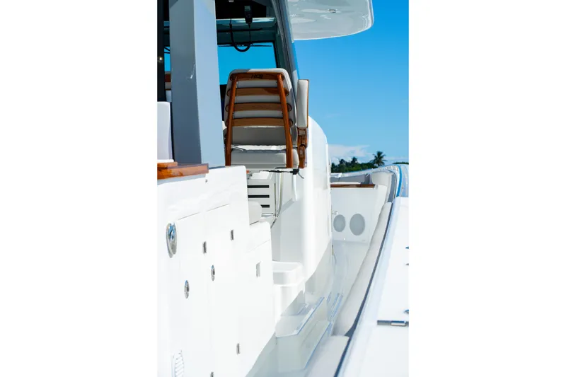 Slide: The Image of 2027 HCB 65 Estrella yacht deck with seating, showcasing sleek design and luxury features. - 69