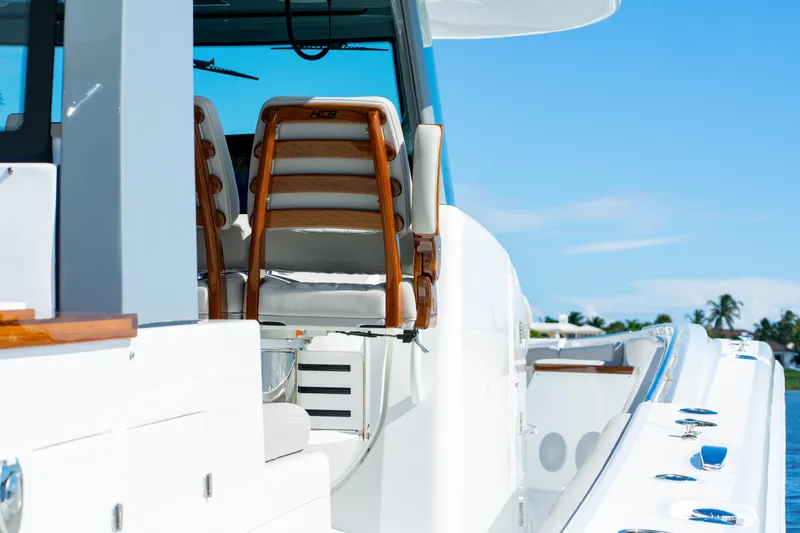 Slide: The Image of Luxury HCB 65 Estrella yacht interior, showcasing elegant seating and sleek design, 2027 model. - 70