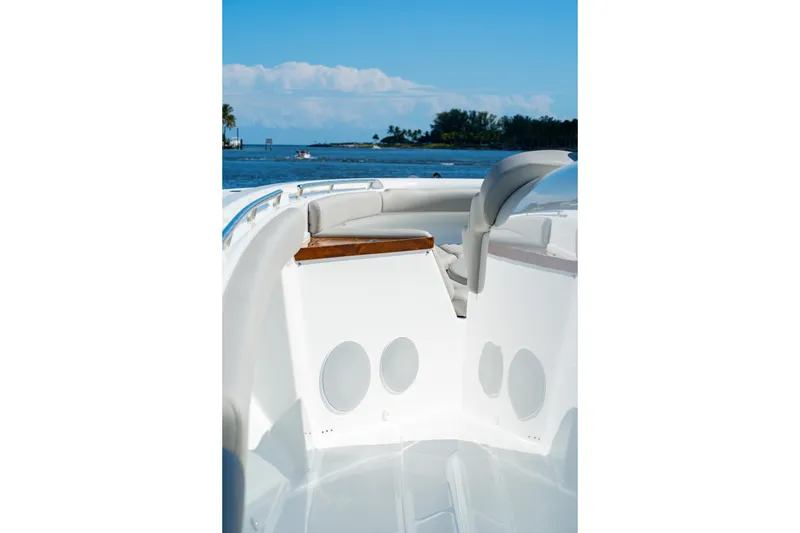 Slide: The Image of Luxury HCB 65 Estrella boat interior, 2027 model, featuring sleek seating and ocean view. - 75