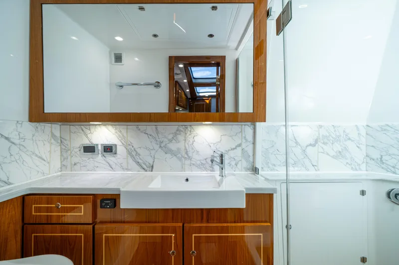 Slide: The Image of Luxurious bathroom interior of 2027 HCB 65 Estrella yacht with marble accents. - 88